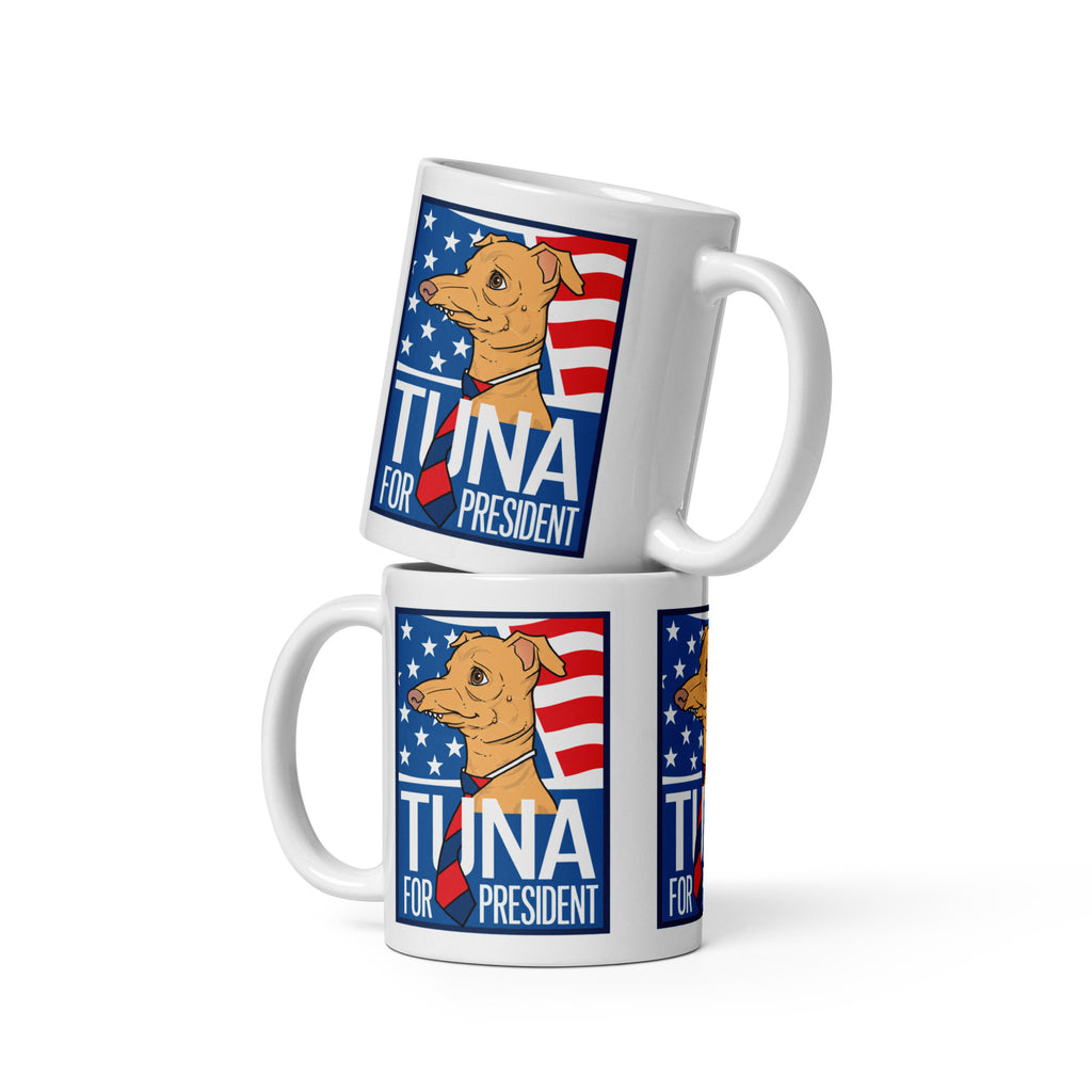 Two stacked Tuna For President mugs, each printed with Tuna in a striped tie before an American flag